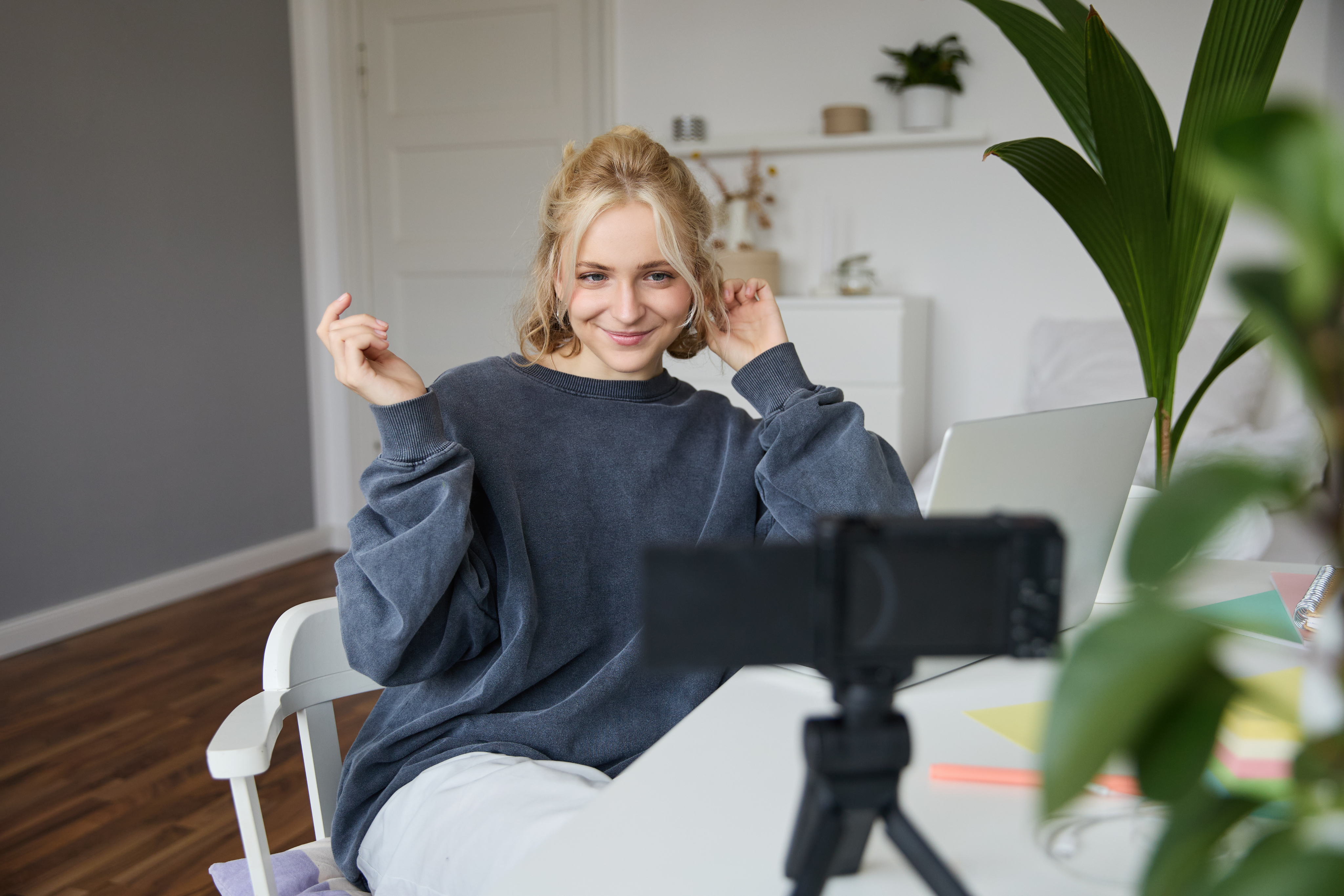 A journalist recording video material